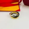 Anello di design Marchio di lusso Anello tricolore Anello Tendenza moda Anello in acciaio inossidabile per giovani coppie fidanzate Anello in acciaio al titanio di alta qualità