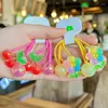 Accessoires de cheveux 2024 Couleur d'été Plastique Fleur de cerisier Bande élastique pour fille Enfants Mignon Kawaii Fantaisie Porte-queue de cheval en caoutchouc Teis