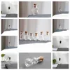 Flaskor 30/50/100st 1:12 Dollhouse Miniature Glass Bottle Vase Cork Cover Lagring Tiny Jar Vias Decor Toy for Doll House