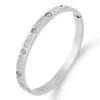 Designer Cartres Bangle Titanium Steel Armband Nytt mode Enkelt och elegant ljus lyxig avancerad färgbeständig full diamant 0cm6