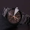 2023 Nuovo orologio da polso in acciaio inossidabile con quadrante bianco e nero, elegante e semplice per donne e uomini