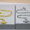 2024 Diseñador Xitai Queenjewellery Collares pendientes de la perla con incrustaciones personalizadas de perlas pequeñas Collar de cadena de Saturno