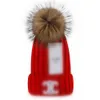 Berretto sportivo con vero berretto di pelo di pelo Berretto con lettera solido invernale a righe da esterno color caramello
