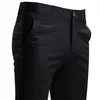 Pantaloni da completo da uomo Pantaloni casual elasticizzati intelligenti Tasca Tinta unita Dritto Indossabile Lunghezza intera Pantaloni da lavoro a casa neri 240106