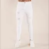 Jeans da uomo Skinny Men Gli uomini slim fit del 2024 sono abiti punk strappati e legati