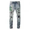 Pantalones de diseñador para hombre Jeans morados Amris 6561 Bordado de moda Cobra Hole Patch Jeans Elástico Slim High Street Denim