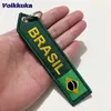 キーリング1PC 2PCS 3PCSセールセールブラジルフラグの両側刺繍矢印形状キーチェーン車トラックバックパックキーチェーンギフト卸売J240108