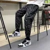 Men's Pants CUMUKKIYP Men's Casual Baggy Pants Cashew Flower Pattern Summer Trendy Personalized Tapered Leg High Street Hiphop Jogging Pants YQ240108