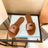 Designer tofflor glider klassisk platt klack sommar lata mode tofflor utsmyckade paljetter med äkta läder sandal lyxdesigners skor fabrikskor