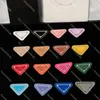 Designer Letter Badge Inverted Triangle Brooches 16 Candy Colors Pins Men Women Letter Suit Coat Bag Decoration Jewelry Accessories Wholesale