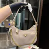 Vrouwenontwerper Saffiano Hobo onderarm schoudertas Italië Milano luxe merk P Triangle Cowhide Leather Leer Tassen Lady Chain Riem Small Hobos Evening Handtas