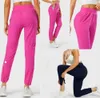 LU-1028 Kvinnor Yoga Wear Girl Jogging Pants Anpassade tillstånd Stretchy High midje Training Strap Gym Pants4365655