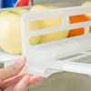La cuisine de diviseur réglable de rangement de vêtements a de nombreuses utilisations durables de l'organisateur de réfrigérateur de réglage gratuit facile à nettoyer l'organisateur de réfrigérateur