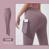 Jambières d'exercices Pantalon de yoga pêche Séchage rapide Ascenseur Ajustement de la hanche Pantalon de course avec poche latérale pour téléphone Sports de plein air JYT002