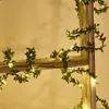 Guirlande lumineuse de vigne à feuilles vertes de 196,85 pouces/50 LED, lumières de fil de cuivre à LED de décoration de Noël, guirlande lumineuse de couronne de vigne verte de feuille de simulation.