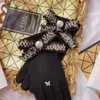 Cinco dedos Guantes Diseñador Puro Lana Bowknot Adorno Guante Mujer Moda Lujo Cuero Genuino Invierno Novia Regalo Negro y Beige
