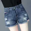 Kvinnors shorts kvinnors shorts denim boxare arbetar korta byxor för kvinna att bära rippade kontor jeans mager tight byte billigt ungdomlig ny i xl yq240108