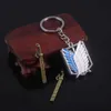 Porte-clés Anime Attaque sur Titan Porte-clés Shingeki No Kyojin Ailes de la Liberté Épée Arme Pendentif Porte-clés pour Hommes Bijoux J240108