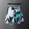 24SS Summer Designer Męskie spodnie plażowe Mężczyzn Men Classic Litera Druk krótkie spodni swobodny bawełniany graffiti drukowane patchwork siatkowe Brody Brody