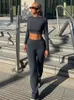 Absobe Fold On Pants Suit Kobiety Załoga Załoga długiego rękawu Slim Crop Top Flare Pants Sport Causal Set Tiet Autumn Streetwear 240108