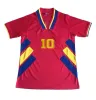 1994 رومانيا المنتخب الوطني للرجال مروحة كرة القدم قمصان هاجي رادوسيو بوبيسكو رومانيا المنزل الأصفر بعيدا قميص كرة القدم الأحمر الرجعية.