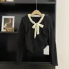 Kvinnors tröjor franska vintage höst stickade kvinnor snörning v-ringning långärmad eleganta tröjor kvinnliga kausala Allsmäktige toppar dropship