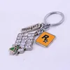 Anahtar Yüzükler Zrm Oyun Grand Theft Auto 5 Keychain Erkekler Hayranlar Mektup Anahtar Zinciri Grand Theft Auto Rock Star Keykey Buckles Araç Aksesuar J240108