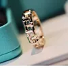 5JP0 Designer Tiffanset Band Rings T Family Double Ring 925 Sterling Silver Plated 18k Gold Wide Version Xiao Zhans samma ihåliga gitter Handsmycken