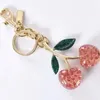Cherry Apple Strawberry Keychain Handbag Pendant Keychain Kvinnors utsökta nätverk Red Cherry Pony -tillbehör Rätt bokstäver