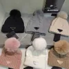 Designerns nya vinter stickade brimfri hatt, fashionabla mäns utomhus kvinnors brimlösa hatt, varm stickad hatt