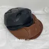 Tasarımcı Top Kapakları Deri Elastik Çıkar Sanatçı Şapkası Büyük Baş Çevre PU Ekran Yüzü Küçük Bulut Şapkası Street Ressam Şapkası Lrzg
