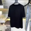 Europeiska män kvinnor t -shirt amerikansk sommar fransk designer rynka krympning ull boll bomull tryck dekal grafiska bokstäver mode vita kanal tees