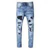 Pantalons de créateurs pour hommes Jeans violets Amris 563 High Street Marque à la mode Trou usé à la main Hot Diamond Jeans Nouveaux pieds élastiques Slim Fit