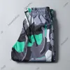 24SS Summer Designer Męskie spodnie plażowe Mężczyzn Men Classic Litera Druk krótkie spodni swobodny bawełniany graffiti drukowane patchwork siatkowe Brody Brody