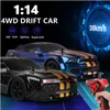 RC Auto 4WD 24G 30KMH Ad alta velocità Drift Racing Macchina radiocomandata 1/14 Giocattoli di controllo remoto per bambini Regali per bambini 240106