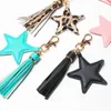 Nyckelringar Sansango Pu Leather Tassel Key Chain for Women Girl Star Pendant Hummer Clasp Key Rings Bag Tillbehör J240108