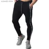 Mäns byxor Autumn New Men's Casual Pants Loose Running Training Sports Pants Europe och USA Patched Foot Pants T240108