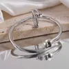 Um clássico cartres pulseira de aço inoxidável conjunto de anel de pulseira para homens e mulheres elegante avançado artesanato incolor