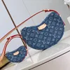 Explosion nouveaux sacs pour femmes M46856 Croissant MM sac à main en coton certifié Denim sangle décontractée bandoulière mini sac bleu toile classique petits pois deux pièces soirée