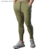 Mäns byxor Autumn New Men's Casual Pants Loose Running Training Sports Pants Europe och USA Patched Foot Pants T240108