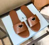 Designer tofflor glider klassisk platt klack sommar lata mode tofflor utsmyckade paljetter med äkta läder sandal lyxdesigners skor fabrikskor