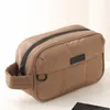 Borse per cosmetici Puffer Organizer per trucchi da viaggio con maniglia Borsa per riporre gli articoli da toeletta per la cura della pelle