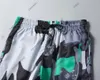 24SS Summer Designer Męskie spodnie plażowe Mężczyzn Men Classic Litera Druk krótkie spodni swobodny bawełniany graffiti drukowane patchwork siatkowe Brody Brody