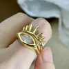 Pierścienie klastra Znakomite złotego koloru pierścienie oka dla kobiet modna sześcienna cyrkonia biżuteria