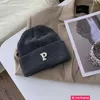 Diseñador Gorras de bola Snail Crawler Inicio Sitio web Rojo P Letra Sombrero de lana Mujer Invierno Estudiantes coreanos Sombrero de punto Sombrero frío Sombrero cálido Niños MAA8