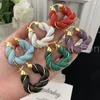 Pendientes de aro Huggie Chevalier d'Eon para mujer, joyería de cuero de moda, tejido de Metal, círculo geométrico, accesorios de joyería 322J