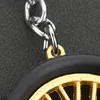 Porte-clés moyeu de pneu en caoutchouc souple PVC, créatif, pendentif de voiture, pendentif de sac d'école modifié pour couple