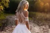 Western Garden Boho Trouwjurken Een Lijn Juweel Hals Kant Satijnen Bruidsjurken Knopen Achter Strand Robe De Mariee Plus Size