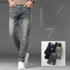 Jeans pour hommes Hommes extensible déchiré maigre Biker broderie dessin animé imprimé jean détruit trou Slim Fit Denim haute qualité Hip Hop noir JeansL240108