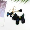 20pcs Tasarımcı Keychain Puppy Gerçek Deri Kolye Anahtar Zinciri Yay Araba Kolye Moda Kişilik Yaratıcı Sevimli Toptan Satış